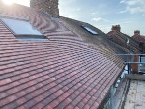 After completion: A newly replaced roof by SM Roofline, showcasing the transformed and improved appearance of the finished project.