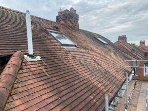 Before image of a roof replacement project by SM Roofline, illustrating the initial condition prior to completion.