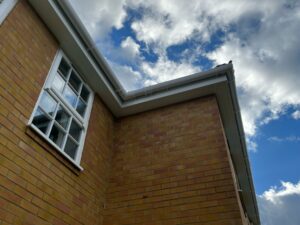 Detailed view of newly fitted white uPVC roofline at Bishops Stortford property showing clean finish