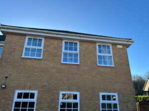  View of old, weathered fascia and guttering before being replaced at a home in Bishops Stortford
