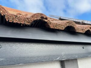Roof edge exposed during preparation for new fascia and soffit installation in Brentwood.