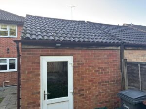Close view of worn fascia and guttering before new installation