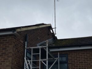  Side roofline area during preparation work before new fascia and soffit installation in Ware