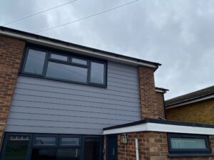 Front elevation after new fascia, soffit, guttering and cladding installation in Ware