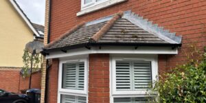 Completed front lower bay with white uPVC fascia and black guttering in Church Langley Harlow