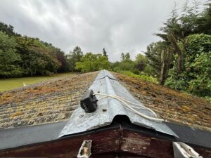 Close view of corrugated roof ridge before work