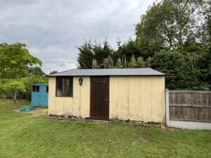 Front view of garage with new EPDM roof