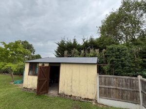 Rear view of garage with EPDM rubber roof